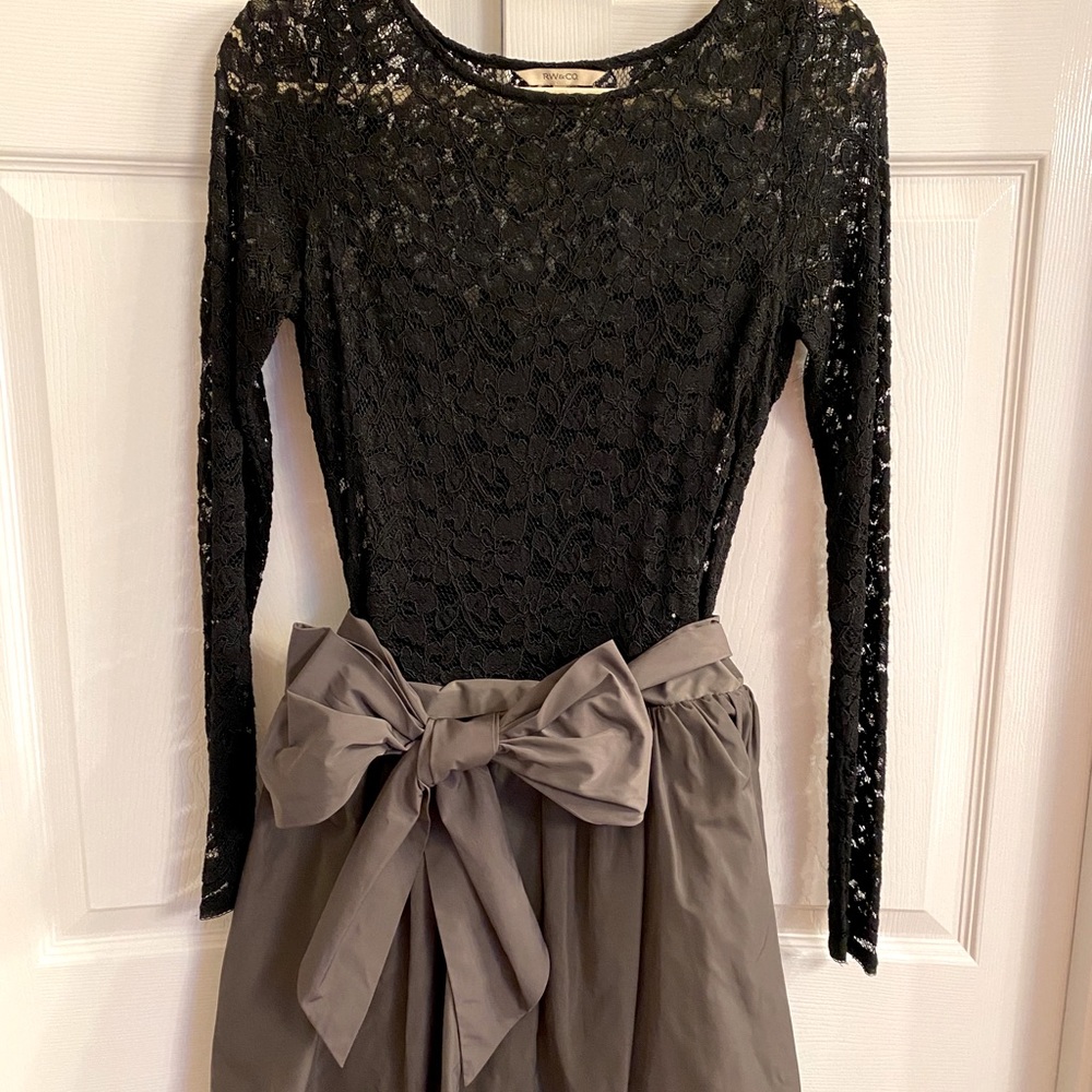 Black sleeved and laced cocktail dress